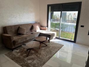 Χώρος καθιστικού στο Résidence Natura Living