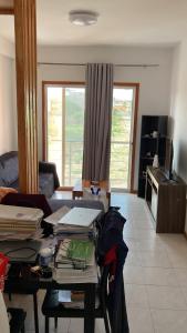 Μια τηλεόραση ή/και κέντρο ψυχαγωγίας στο Apartamento IFH