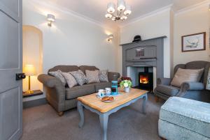 Et opholdsområde på The Old Police House - Cottage