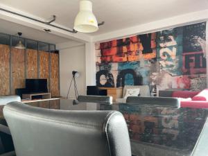 TV a/nebo společenská místnost v ubytování Green River Loft + 22 fotografií