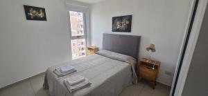 Postel nebo postele na pokoji v ubytování Lo de Chicho