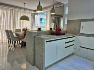 Køkken eller tekøkken på CURTA! | 175 | Sofisticado e Espaçoso | 3 Suítes