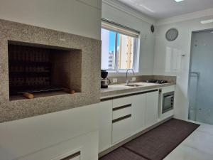 Køkken eller tekøkken på CURTA! | 175 | Sofisticado e Espaçoso | 3 Suítes