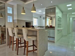 Køkken eller tekøkken på CURTA! | 175 | Sofisticado e Espaçoso | 3 Suítes