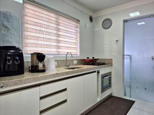 Køkken eller tekøkken på CURTA! | 175 | Sofisticado e Espaçoso | 3 Suítes + 20 billeder