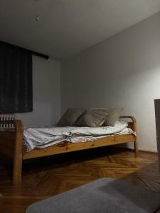 Ένα ή περισσότερα κρεβάτια σε δωμάτιο στο MiddleHome Travnik