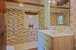 Koupelna v ubytování Can More El Pasteral Alojamiento Rural + 58 fotografií