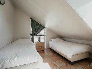 Ένα ή περισσότερα κρεβάτια σε δωμάτιο στο Apartment in Waterpark with Private Jetty