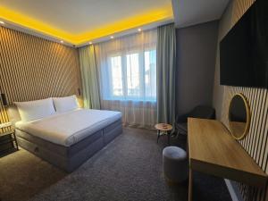 Postel nebo postele na pokoji v ubytování B&B Centar