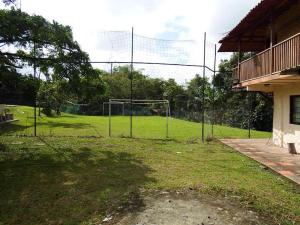 a fenced in field with a soccer goal at Finca la Albania in Circasia