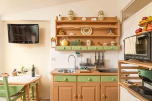 Kuchyň nebo kuchyňský kout v ubytování La Casina di Dany