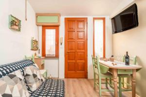 TV a/nebo společenská místnost v ubytování La Casina di Dany