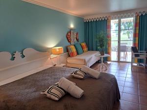 Ένα ή περισσότερα κρεβάτια σε δωμάτιο στο DESIRADE 18 sainte luce +47 φωτογραφίες