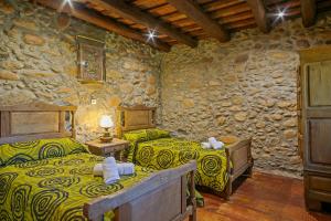 Postel nebo postele na pokoji v ubytování Can More El Pasteral Alojamiento Rural