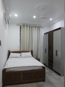 Ένα ή περισσότερα κρεβάτια σε δωμάτιο στο The DomeApp Apartment