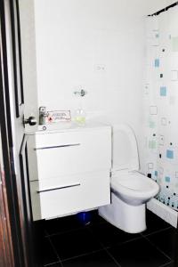 Koupelna v ubytování Hostal Wayare Filandia + 30 fotografií