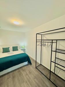 Postel nebo postele na pokoji v ubytování ByStreetHouse