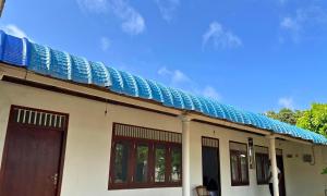 a blue roof on top of a house at N28 Negombo in Negombo