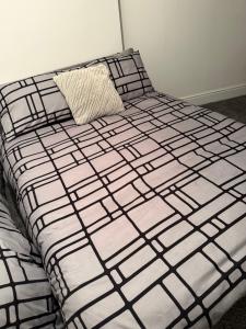 Ένα ή περισσότερα κρεβάτια σε δωμάτιο στο City Apartment