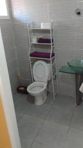 Koupelna v ubytování Small functional and impeccable loft facing the sea