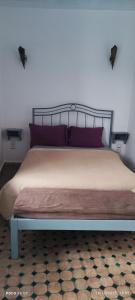 Postel nebo postele na pokoji v ubytování dar darko