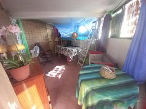 an overhead view of a room with a bed and a table at Casa Fabrice in Ribeira da Prata