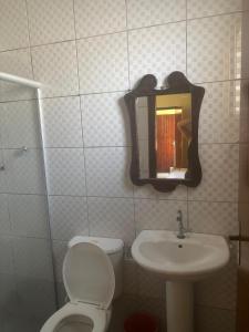 Ένα μπάνιο στο Suítes Florais - Itaguá +42 φωτογραφίες