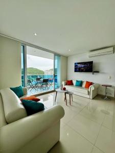 TV a/nebo společenská místnost v ubytování Salida directa a la playa T1 + 9 fotografií