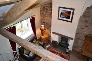 an overhead view of a living room with a wood stove at Netherend in Threlkeld +15 photos