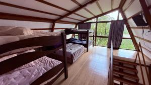 Ένα ή περισσότερα κρεβάτια σε δωμάτιο στο Cattaleya