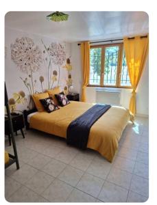 Ένα ή περισσότερα κρεβάτια σε δωμάτιο στο Les Petites Écuries