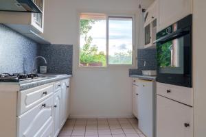 Η κουζίνα ή μικρή κουζίνα στο Villa Canelle