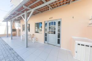 Balkón nebo terasa v ubytování BRUNO KLEMTZ DS1 - CASA COM PISCINA, PARQUE INFANTIL E SALA DE JOGOS- 2 dorm - MEIA PRAIA - ITAPEMA