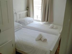 Postel nebo postele na pokoji v ubytování Oake Cottage + 5 fotografií