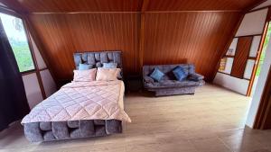 Ένα ή περισσότερα κρεβάτια σε δωμάτιο στο Orquídea