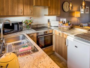 Kuchyň nebo kuchyňský kout v ubytování The Helmsley Retreat