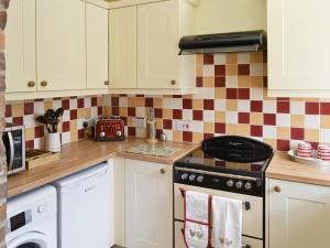 Køkken eller tekøkken på South View Cottage