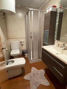 Ένα μπάνιο στο Apartamento céntrico