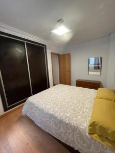 Ένα ή περισσότερα κρεβάτια σε δωμάτιο στο Apartamento céntrico