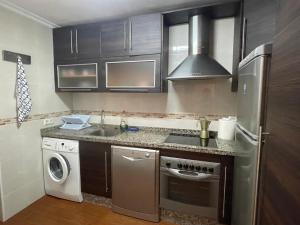 Η κουζίνα ή μικρή κουζίνα στο Apartamento céntrico +5 φωτογραφίες