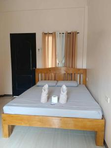 Postel nebo postele na pokoji v ubytování James homestay 2