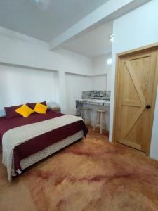 Postel nebo postele na pokoji v ubytování Casa Tamarindo