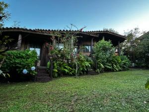 Κήπος έξω από το Encanto do Mar Praia do Rosa