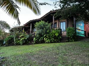 Κήπος έξω από το Encanto do Mar Praia do Rosa