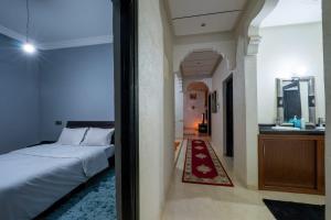 Postel nebo postele na pokoji v ubytování Dar Yassan