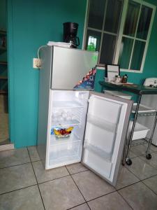 Køkken eller tekøkken på Hostal Las Flores