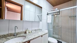 Koupelna v ubytování Casa Ipê + 24 fotografií