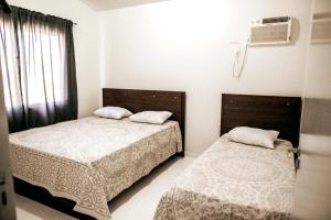 Postel nebo postele na pokoji v ubytování DS2 - 2 Dorm PIscina AR WIFI Churrasqueira - BRUNO KLEMTZ + 31 fotografií