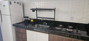 Nhà bếp/bếp nhỏ tại Loft proximo a orla 01 +7 ảnh