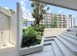 a view from the balcony of a building at New condo near the sea, Laguna, Choeng Thale 324 in Ban Thalat Choeng Thale